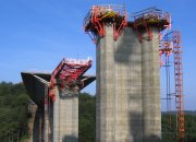 Incremental launching of bridge superstructures